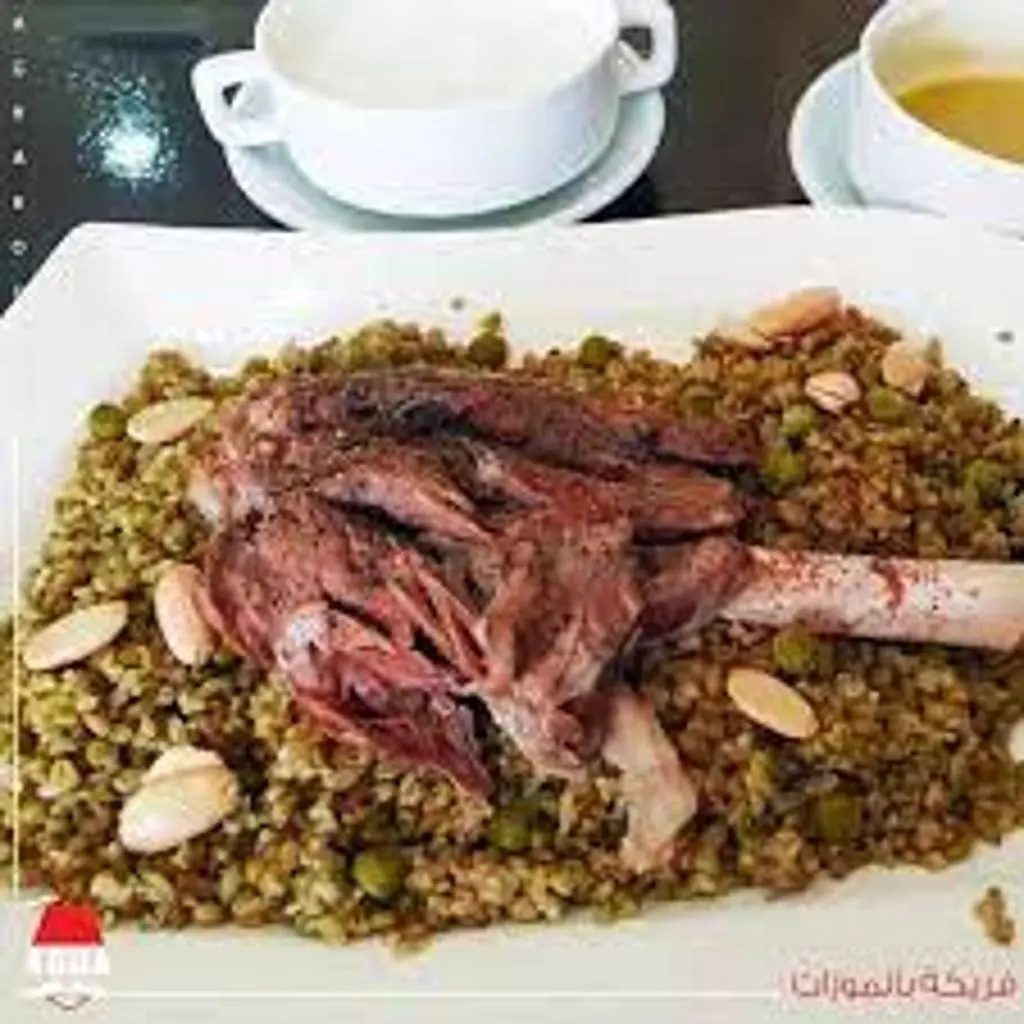 Meat Shanks with Freekeh and Ghee
